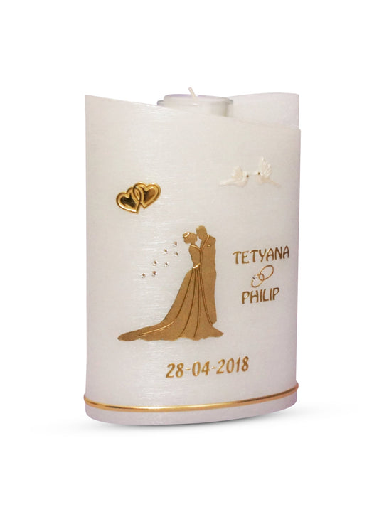 Hochzeitskerze Brautpaar in Gold auf einer Perlmutt Kerze