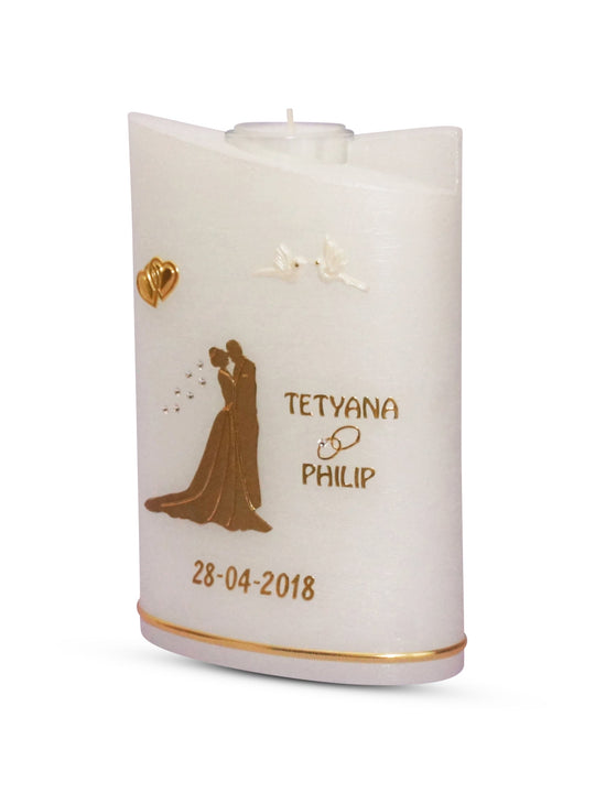 Hochzeitskerze Brautpaar in Gold auf einer Perlmutt Kerze